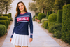 Women golfer wearing long sleef golf top at the clubhouse