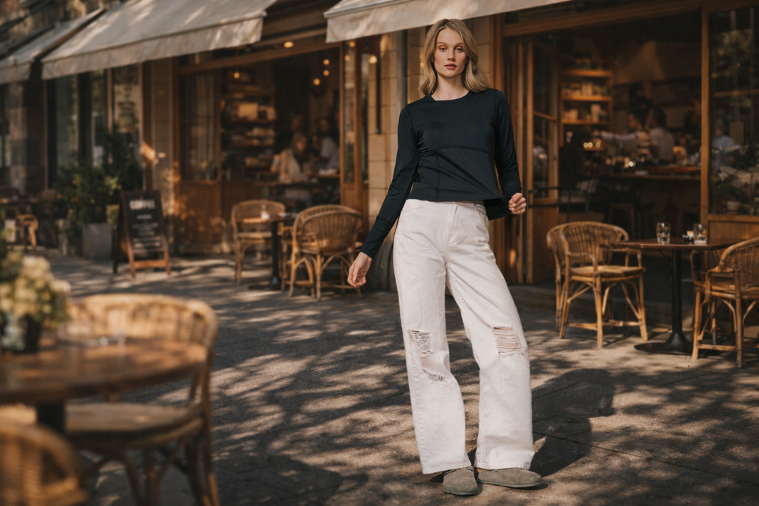 Young woman outside artisan coffee shop