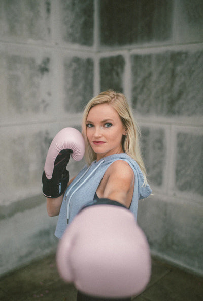 woman-exercise-makeup-boxing-gloves