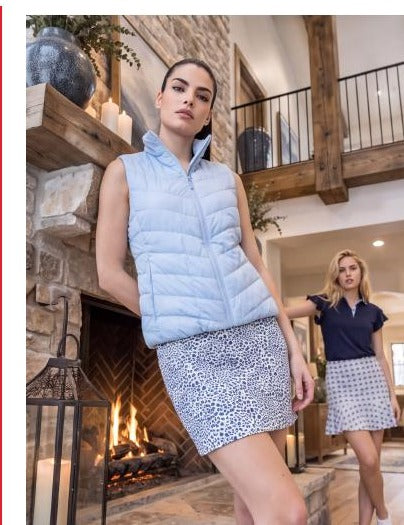 Harlo Snow Leopard skort with Heritage vest — lifestyle hero